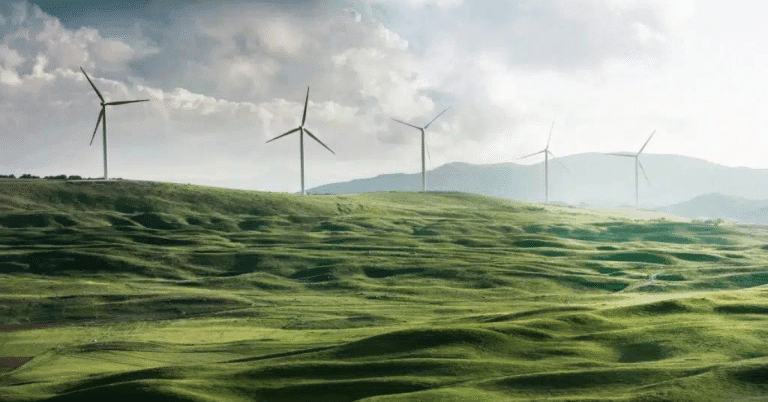 Windmills in a green landscape producing green energy