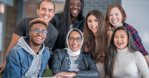 A diverse team on the picture which is one the items of positive discrimination