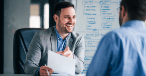 A corporate recruiter with a headhunter hiring new employees