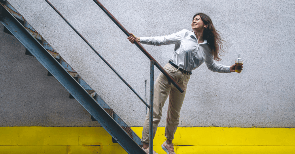 Modern office with professionals working remotely and in person, illustrating flexible liquid careers with Kilpatrick.